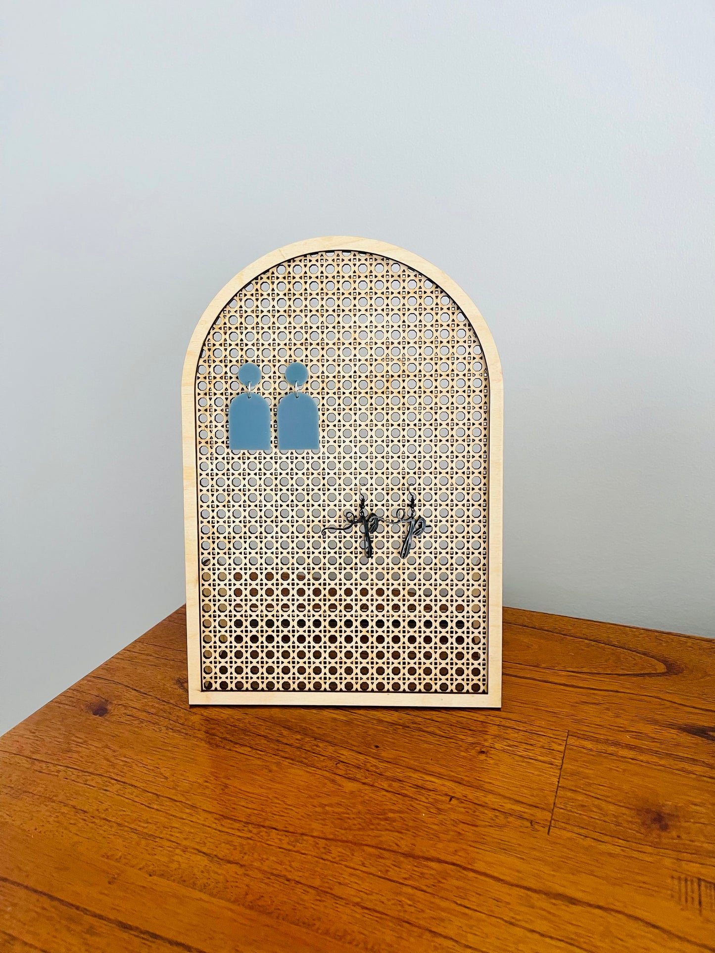 Arch earring stand