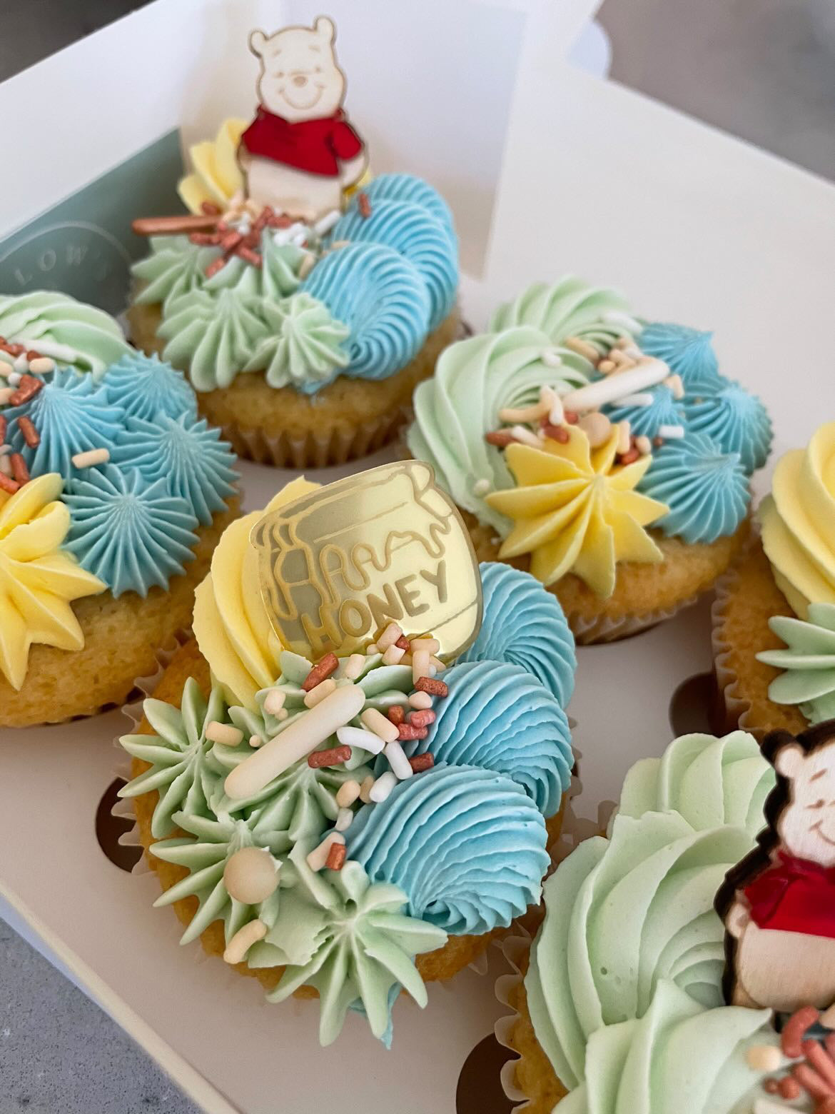 Winnie The Pooh themed cupcake topper