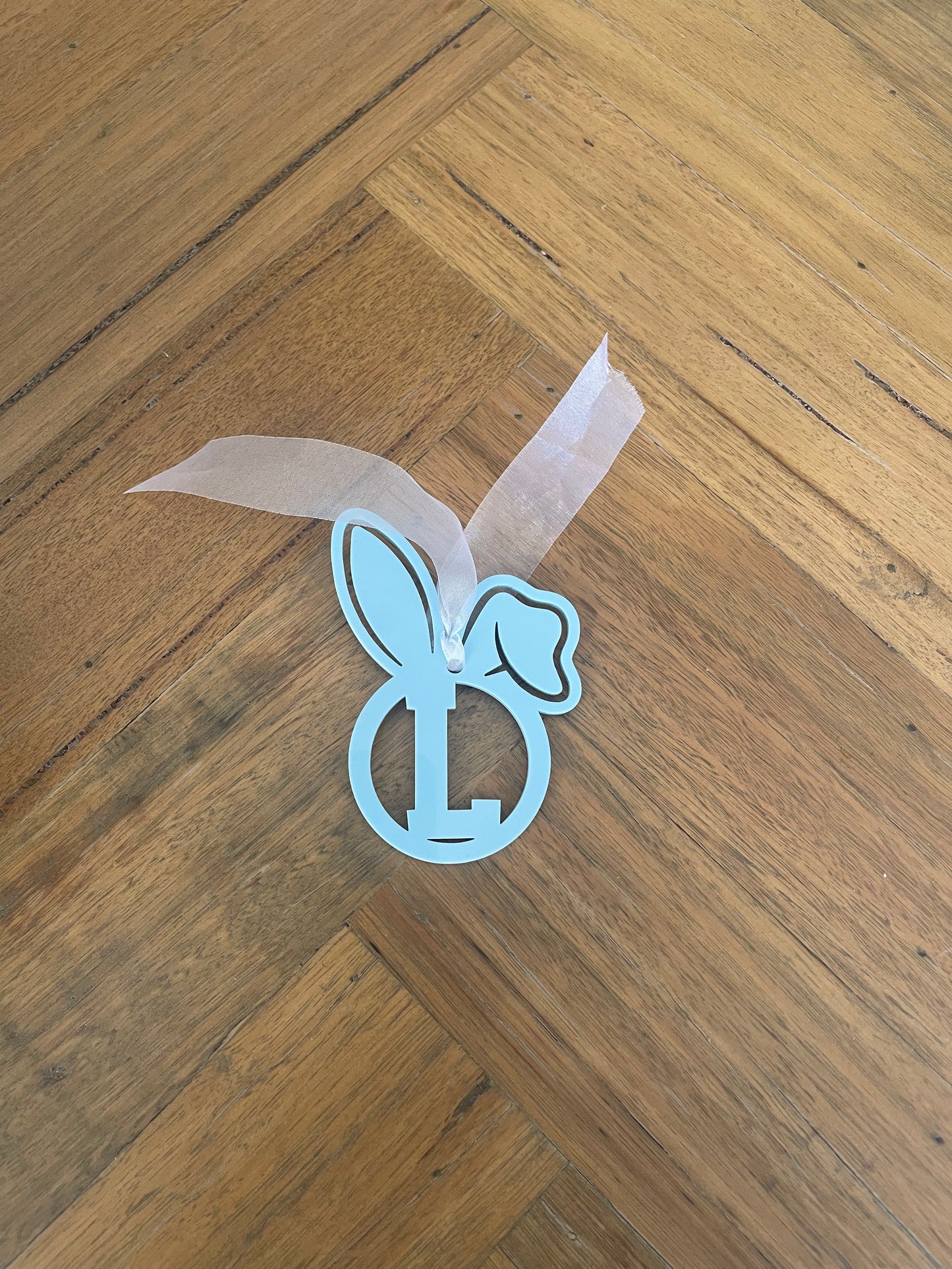 Bunny ear initial tags